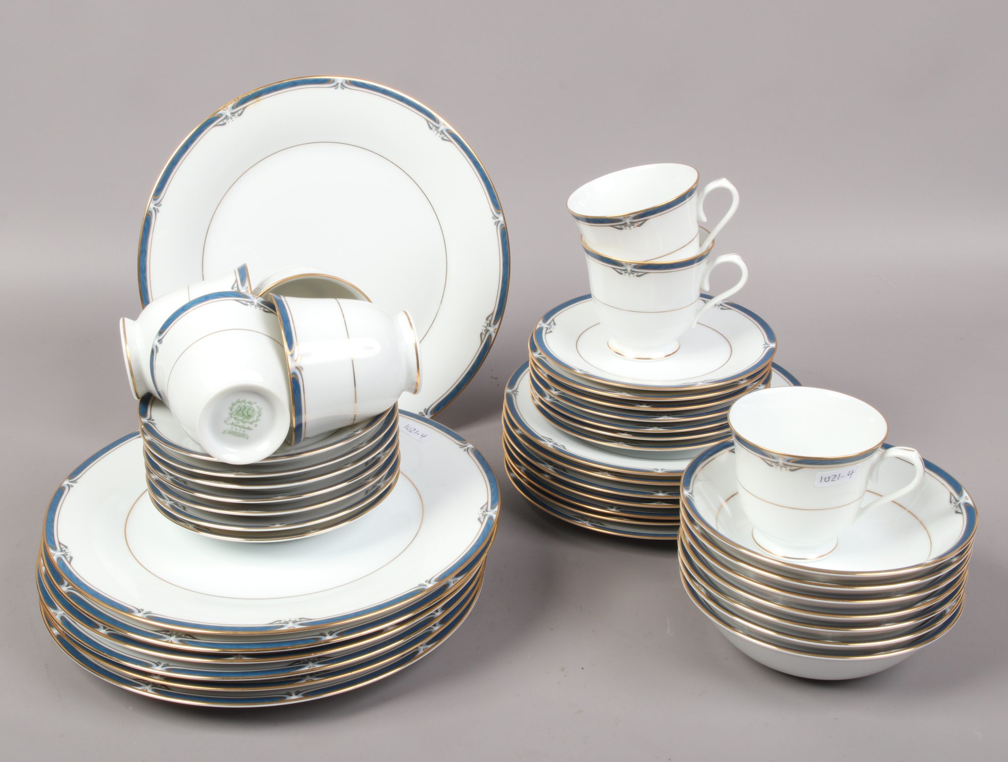 A collection of Noritake bone china tea and dinnerwares in the Impression design.