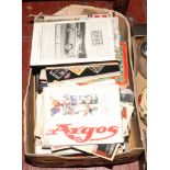 A box of c1980s catalogues, magazines, childrens annuals and games.