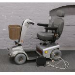 A Rascal electric mobility scooter with charger.Condition report intended as a guide only.Battery