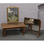 An embroidered fire screen hunting scene along with a coffee table with turned legs and a dressing