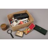 A box of collectables to include Parker pen, trinkets, vintage tins etc.