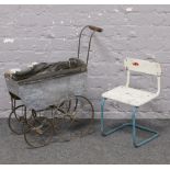 An antique style dolls pram and a vintage child's chair.