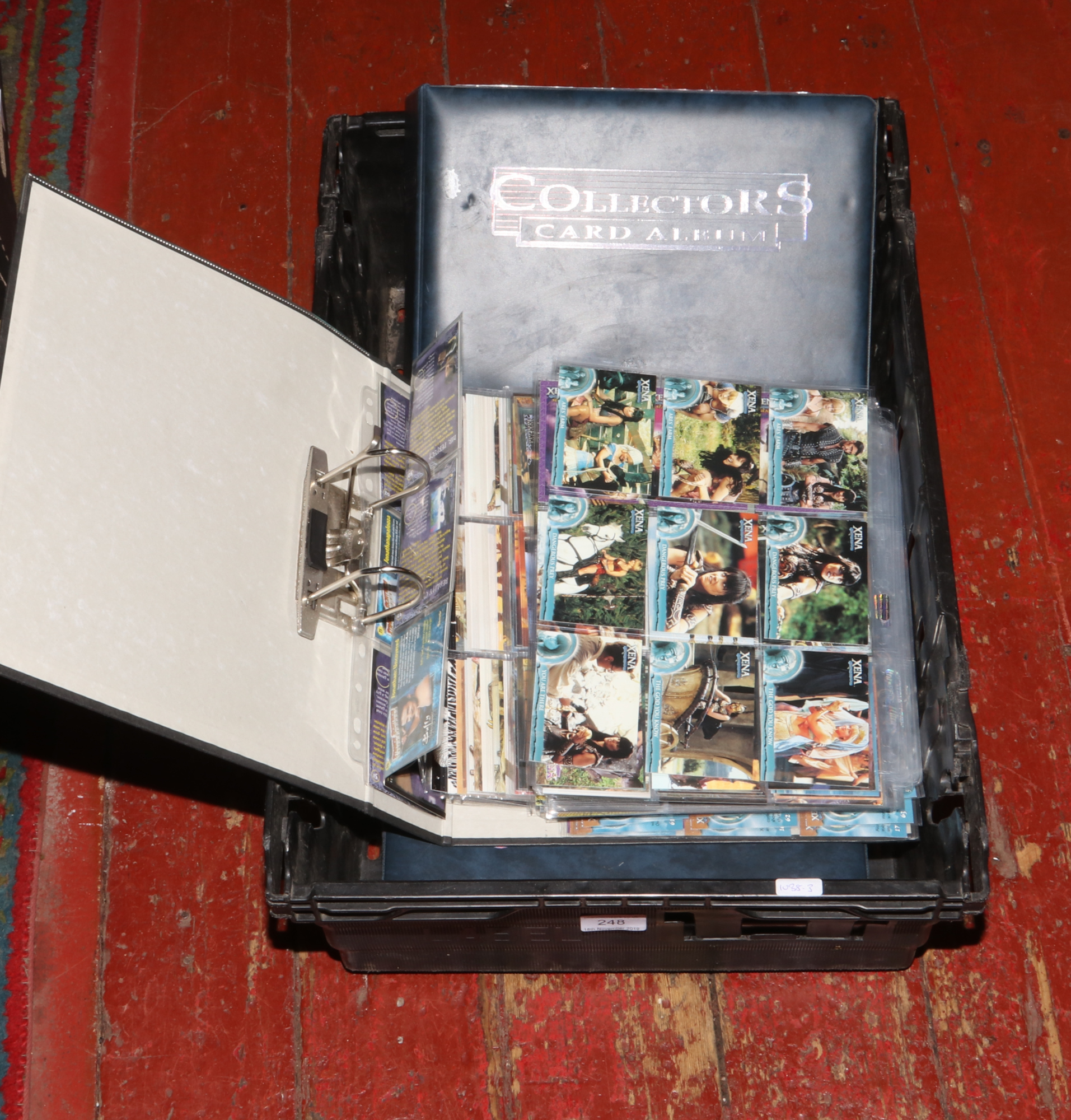 Three collectors card albums and contents of trade cards to include Captain Scarlet, Tarzan and