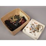 A box of costume jewellery earrings, necklaces, rings etc.