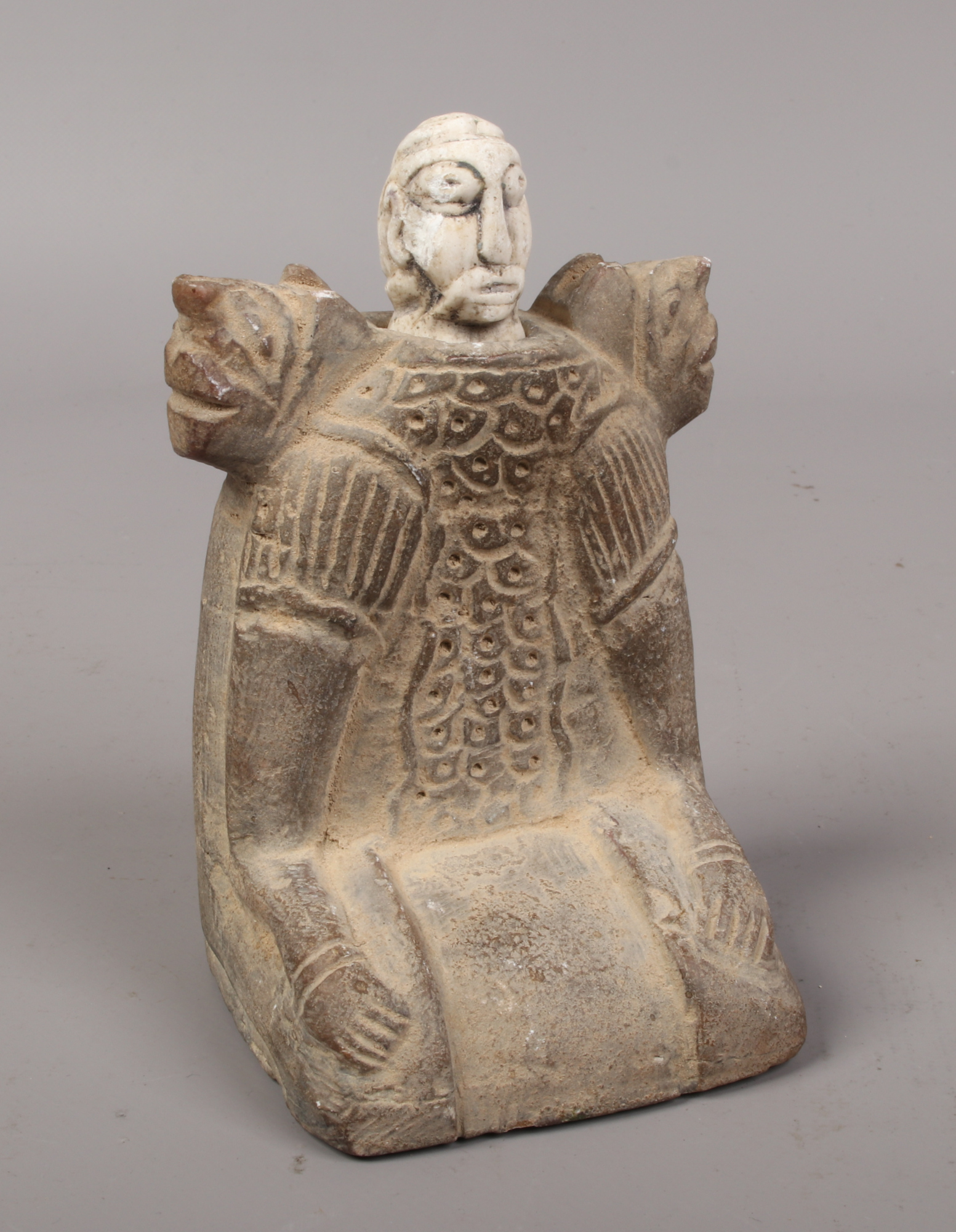 A Bactrian carved stone idol.