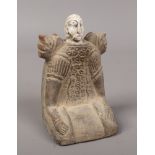 A Bactrian carved stone idol.