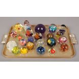 A tray of glass paperweight including Mdina, split cane, controlled bubble etc 23 in total.
