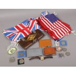 A box of collectables to include Sekonda quartz wristwatch, cigarette cases, flags, commemorative