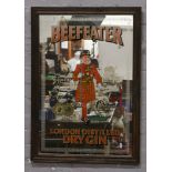A framed Beefeater London distilled dry gin advertising mirror.