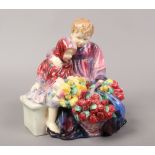 A Royal Doulton ceramic figure group named The Flower Sellers Children HN1342.