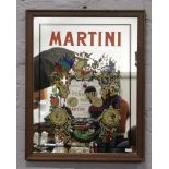 A framed Martini advertising mirror.