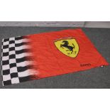 A Scuderia Ferrari flag.