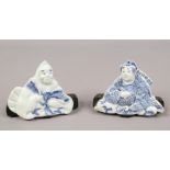 A pair of Chinese blue and white flat back porcelain figures / bookends.