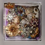 Thirty costume jewellery brooches including vintage coloured stone set and white metal examples.