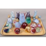 A tray of coloured glass art vases, paper weights and perfume atomisers to include Caithness