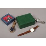 An empty Rolex box, along with three wristwatches and a pocket watch including a Seiko manual