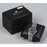 A boxed quartz Tag Heuer wristwatch.