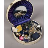 A mirror back jewellery box with contents to include silver ring, Wedgwood cameo pendant, quartz