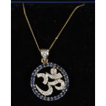 A 9ct gold pendant chain, set with sapphire and diamond to form the Sanskrit OM symbol.