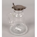 A silver top glass Whisky noggin, assayed Birmingham 1917 by Asprey & Co. Ltd.