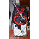 A collection of sporting equipment to include England rugby kit bag, hockey sticks, golf balls etc.