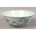 A Chinese Swatow ware bowl probably 17th century painted in underglaze blue with dragons and