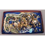A tray of vintage necklaces and earrings to include coloured paste example.