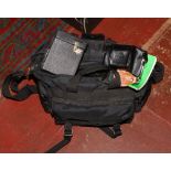 A camera bag and contents Fujica ST60SN 35mm SLR camera various lenses, flash gun, along with