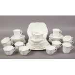 A collection of mainly Shelley dainty design white china teawares, to also include similar Foley
