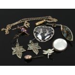 A quantity of silver and white metal brooches and earrings including mother of pearl and niello