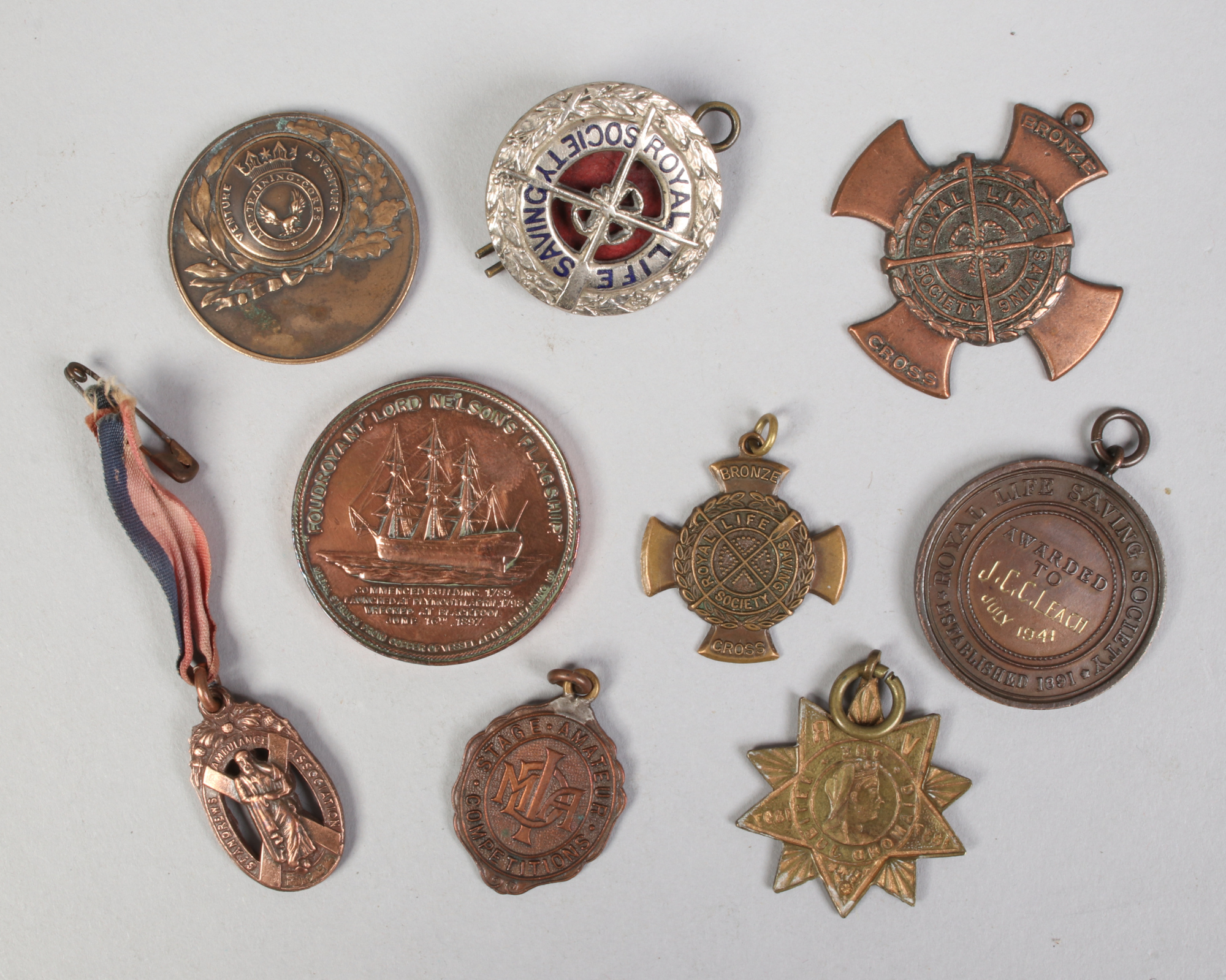 A quantity of mostly mid 20th century life saving medals, along with a commemorative example for