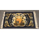 A blue ground 1952- 1977 silver jubilee rug, 140cm x 77cm.