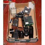 A box of camera equipment to include Kodak box camera, Olympus Trip 35 camera, lenses etc.