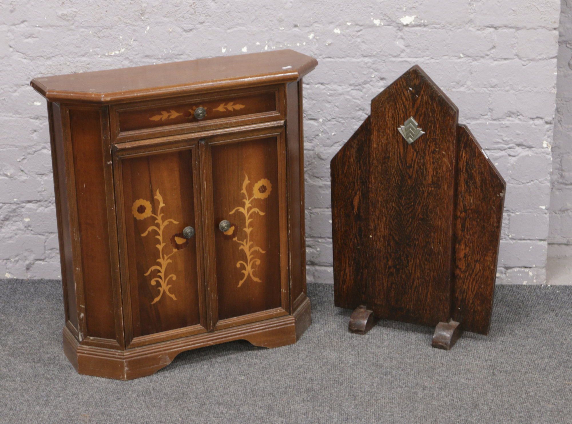 An Art Deco oak firescreen and a marquetry side cabinet.