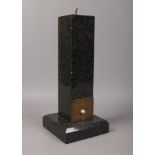 A black granite table lamp base.