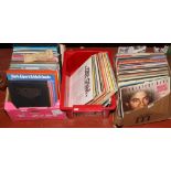 Three boxes of single and L.P records to include ABBA, Tony Christie, Barry White etc.