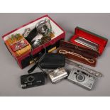 A box of collectables to include cameras, Hohner Chromonica 270, Britains Deetail soldiers.