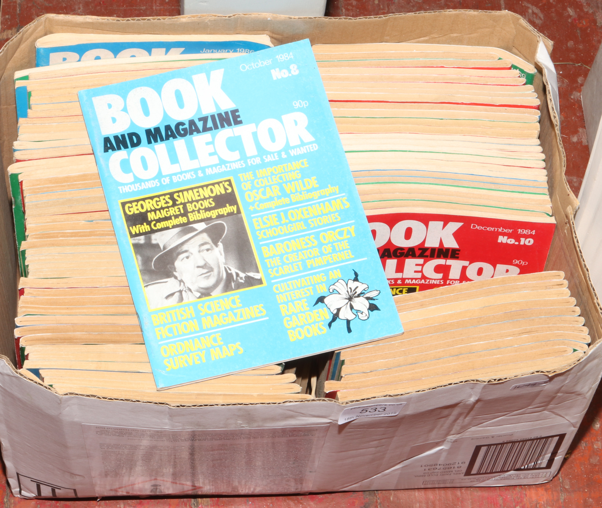 A box of 1980s and 1990s book and magazine collectors issue.