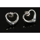 A pair of Tiffany & Co. silver open heart earrings.