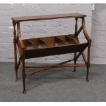 A Regency style mahogany book trough raised on turned supports.