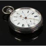 A silver chronograph pocket watch with subsidiary dial and Roman numerals marks, curvette also