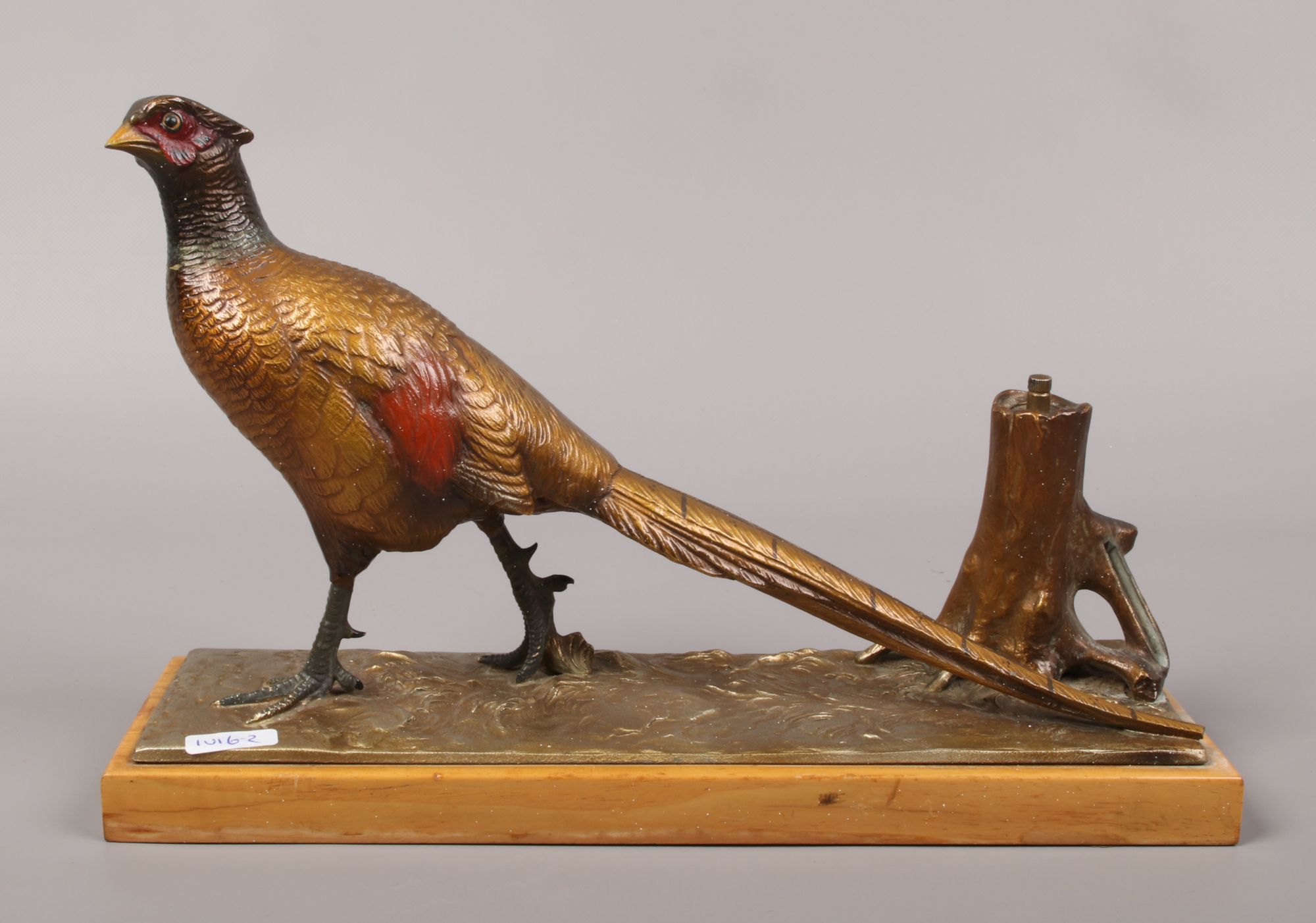 A mid 20th century cold painted spelter pheasant table lighter.Condition report intended as a