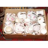 A box of mixed teawares to include Rosina, two Royal Winton vases, Coalport posy, three