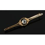 A cased 15ct gold aquamarine and seed pearl bar brooch.
