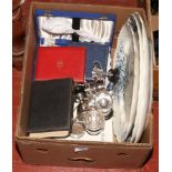 A box of miscellaneous to include pottery meat plates, silver mounted vessel, cased flatwares and