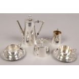 An Art Deco Czechoslovakian silver coffee set including coffee pot, sucrier cream jug and two