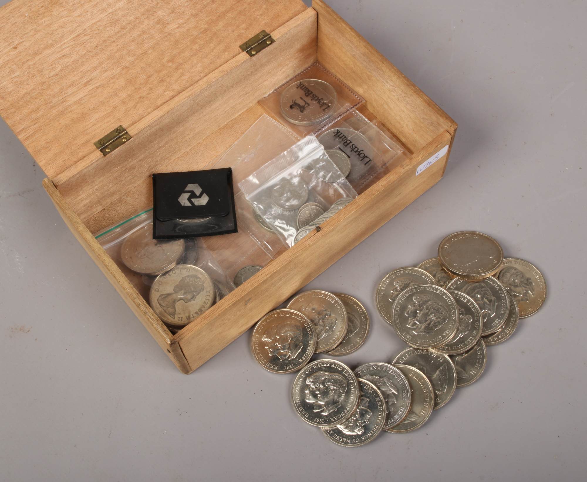 A collection of commemorative crowns and pre-decimal silver coins.