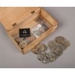 A collection of commemorative crowns and pre-decimal silver coins.