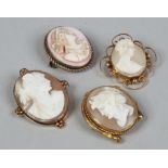 Four Victorian carved shell cameo brooches, 2 marked 9ct and one silver gilt.