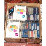 A box of Atari 1040ST family curriculum discs etc.